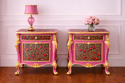 Two ornate sideboards with pink and gold accents in a room with white walls. Upcycled Antique Cherry Cheetah Nightstands \| La Vie Nouveau Décor Shoppe